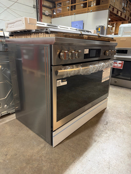 Frigidaire GCFD3661AF 36 Inch Freestanding Dual Fuel Range with 6 Sealed Burners, 4.6 cu. ft. Convection Oven - Open Box in a showroom.