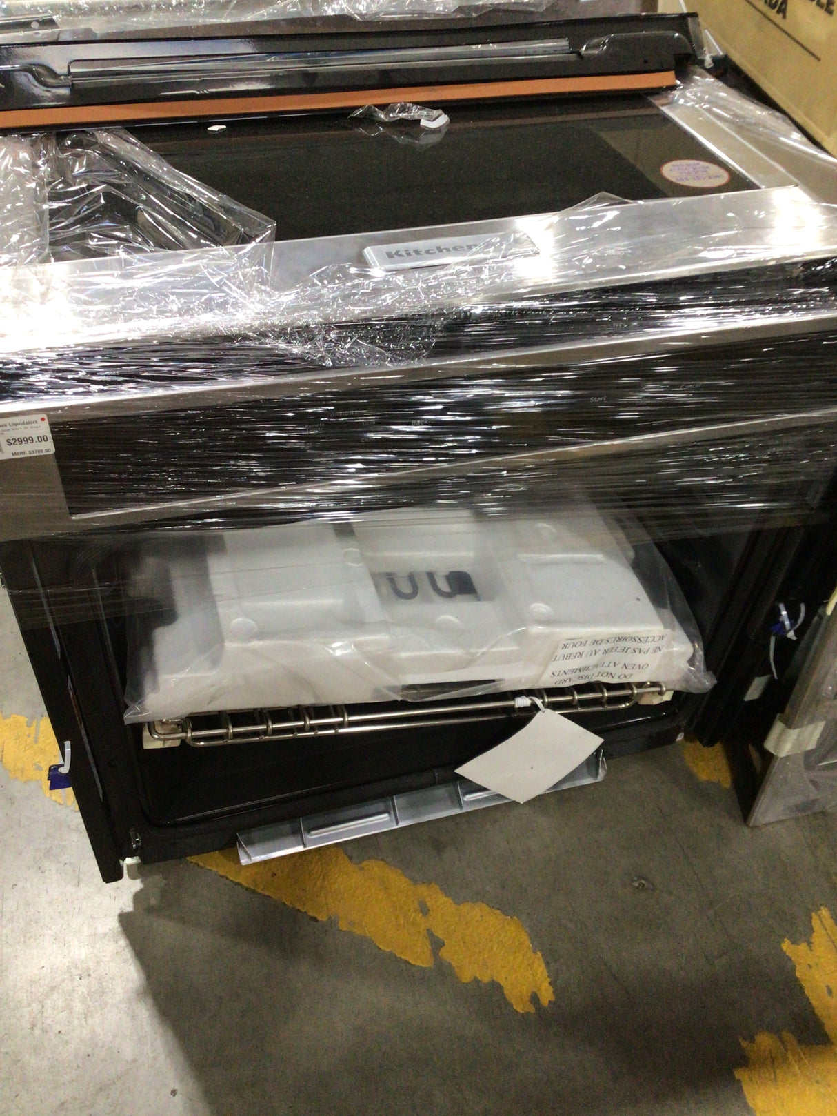 KITCHENAID KOSE900HSS Smart Oven+ 30" Single Oven wrapped for protection, perfect for appliance liquidation and overstock appliances deals.