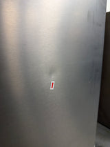 Frigidaire FRFC2323AS - 23 Cu. Ft. Counter-Depth French Door Refrigerator - Scratch & Dent showing minor dent on stainless steel surface.