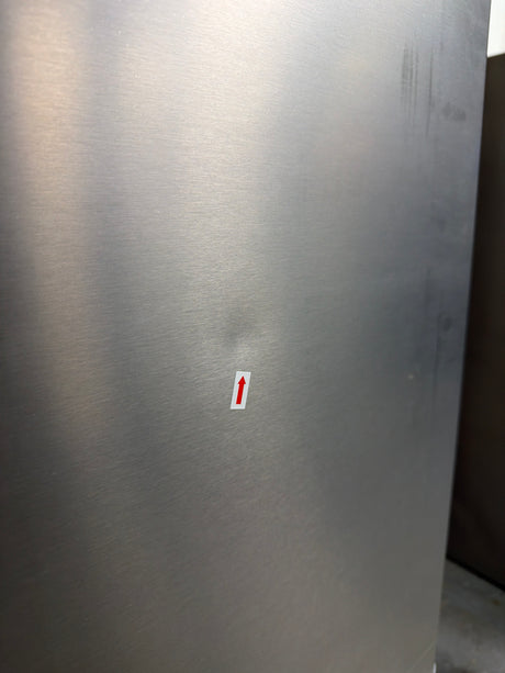 Frigidaire FRFC2323AS - 23 Cu. Ft. Counter-Depth French Door Refrigerator - Scratch & Dent showing minor dent on stainless steel surface.