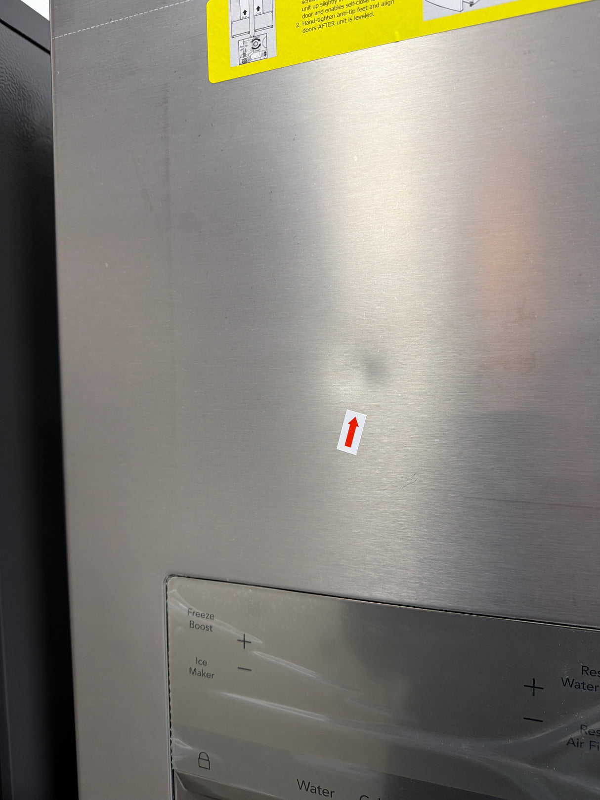 Frigidaire FRFC2323AS - 23 Cu. Ft. Counter-Depth French Door Refrigerator - Scratch & Dent with minor dent on stainless steel finish.