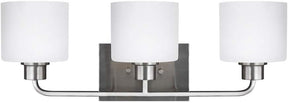 Generation Lighting 4428803-962 - Canfield 3 Light 23 inch Bath Light in Brushed Nickel with sleek design and glass shades.