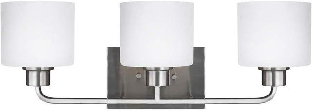 Generation Lighting 4428803-962 - Canfield 3 Light 23 inch Bath Light in Brushed Nickel with sleek design and glass shades.