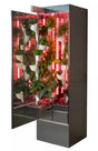 Vertical hydroponic garden with plants illuminated by red lights inside a cabinet.
