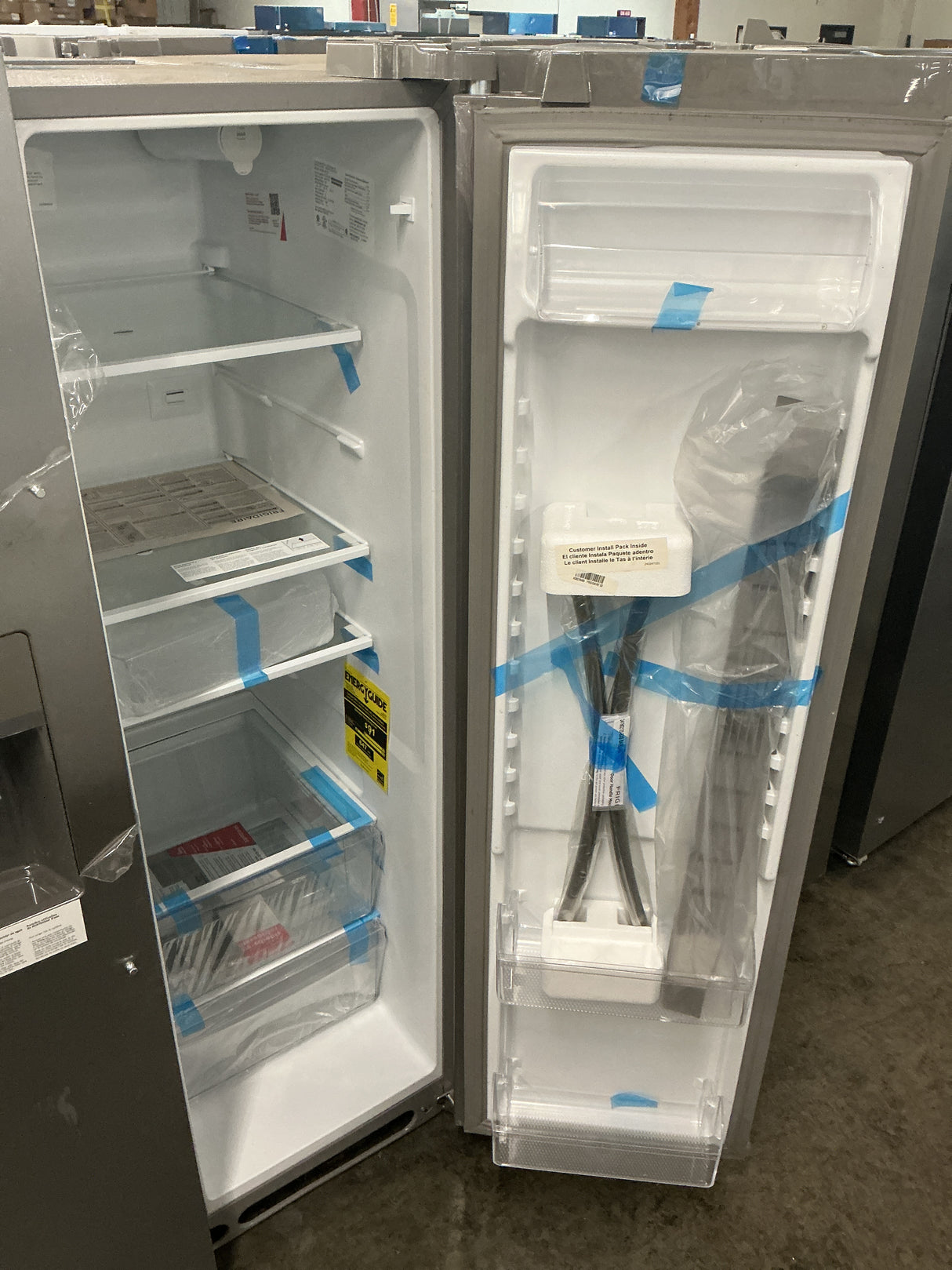 Frigidaire FRSS2623AS Side-by-Side Refrigerator (Open Box / Scratch & Dent)
