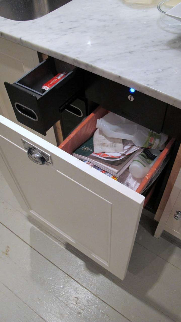 K021 Krushr trash compactor with custom panel and recycling drawer